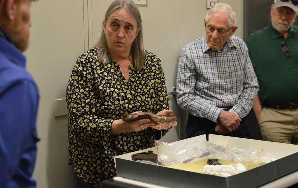 Museum volunteers visit artifact storage facility