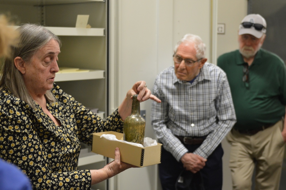 Museum volunteers visit artifact storage facility