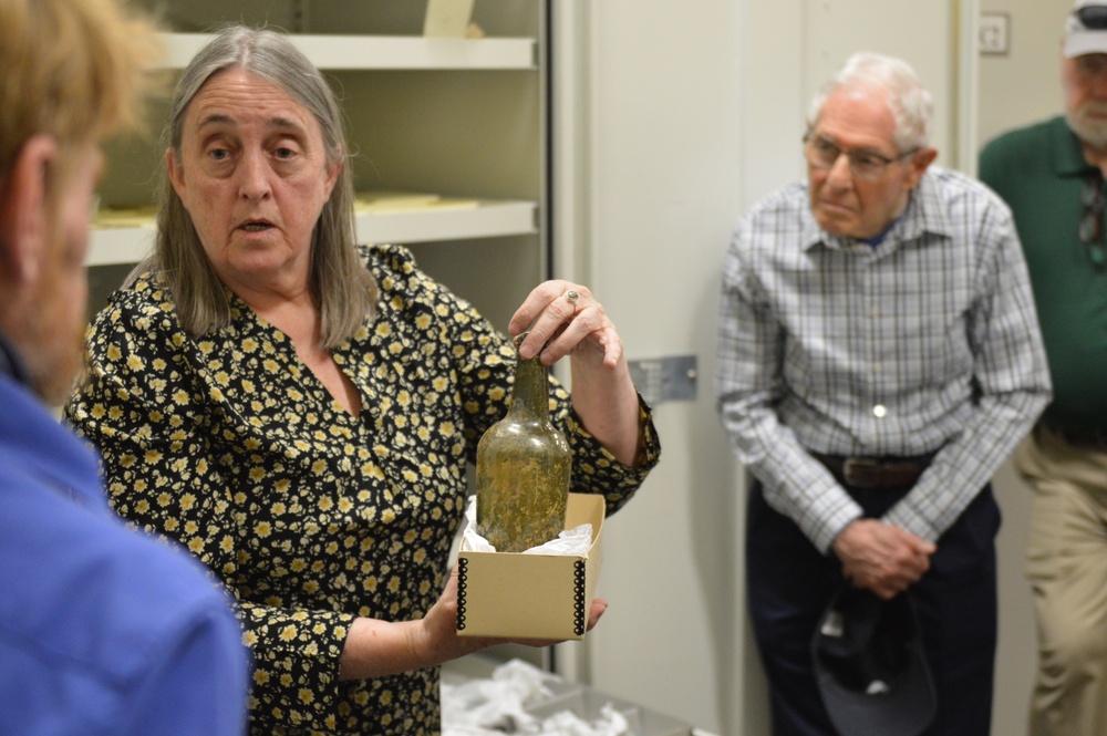 Museum volunteers visit artifact storage facility
