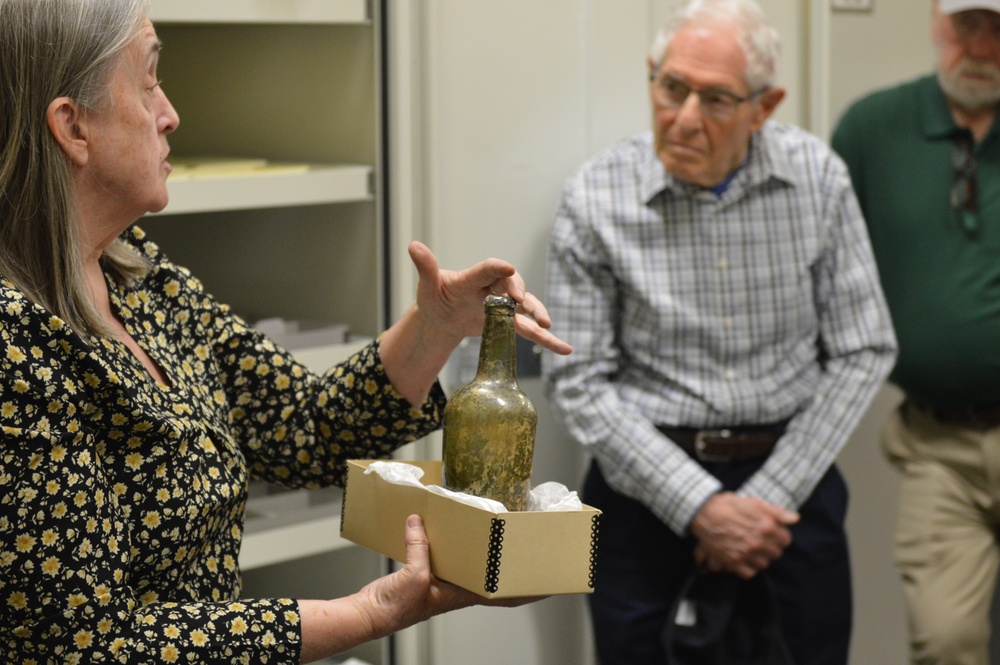 Museum volunteers visit artifact storage facility