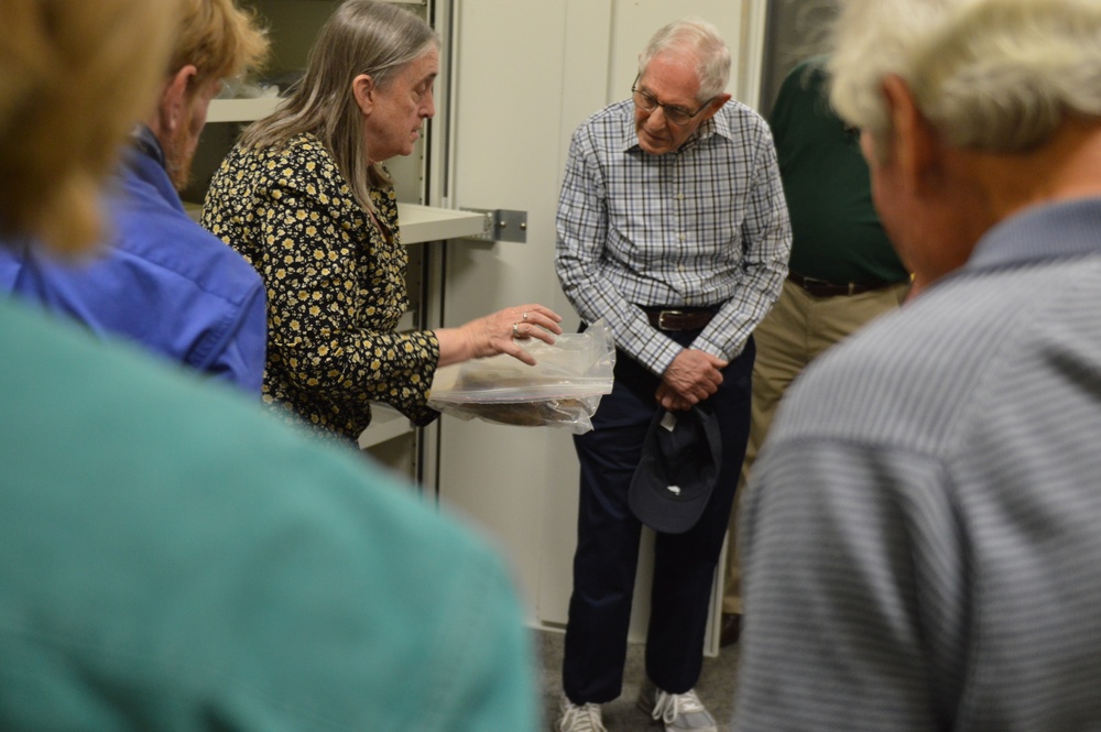 Museum volunteers visit artifact storage facility