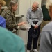 Museum volunteers visit artifact storage facility