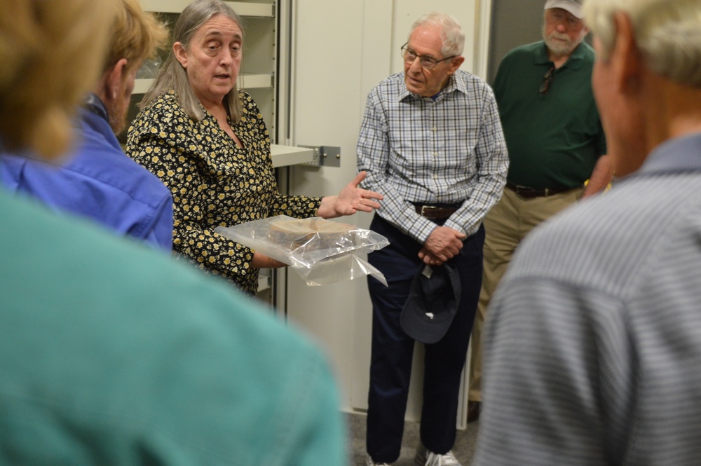 Museum volunteers visit artifact storage facility