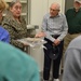 Museum volunteers visit artifact storage facility