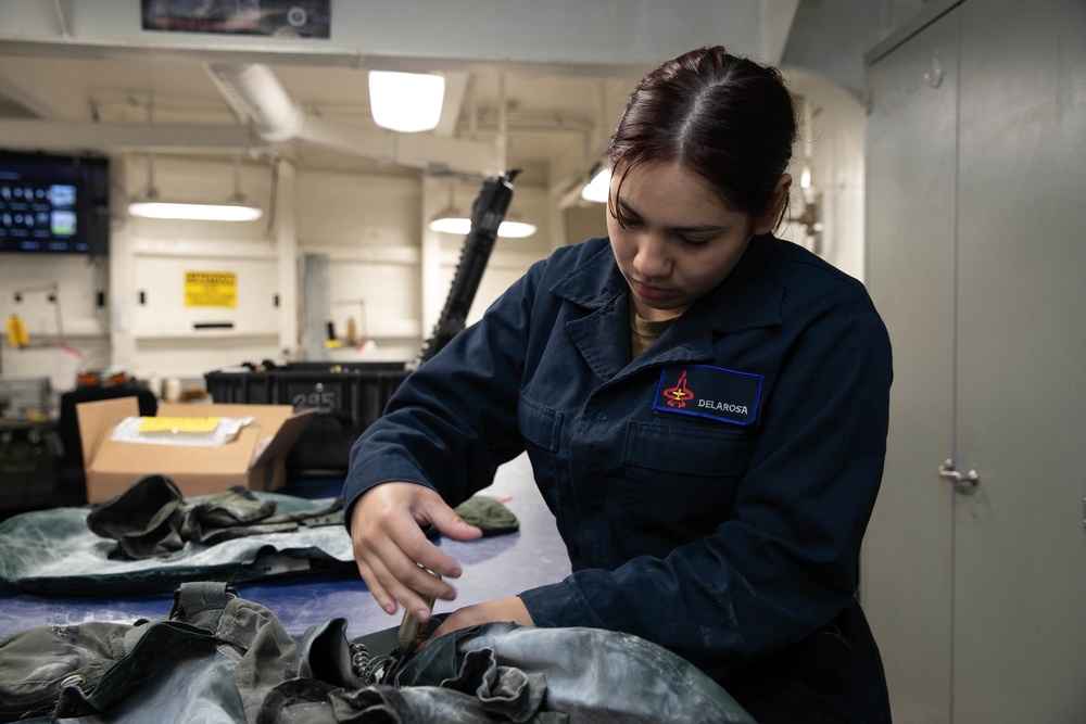 USS George H.W. Bush (CVN 77) Sailor Performs Maintenance