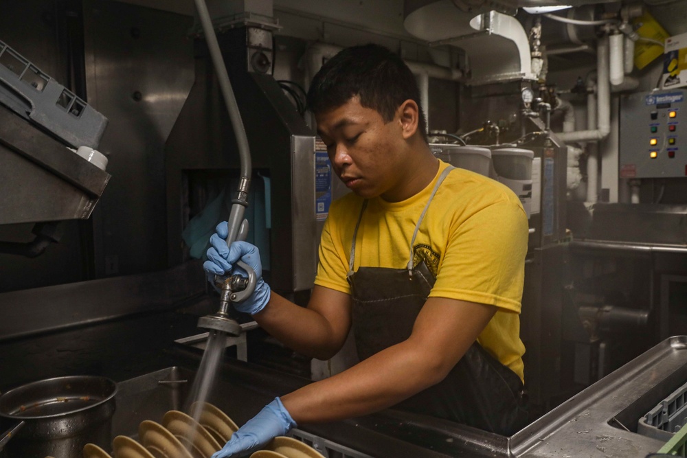 USS George H.W. Bush (CVN 77) Sailors Works in the Scullery