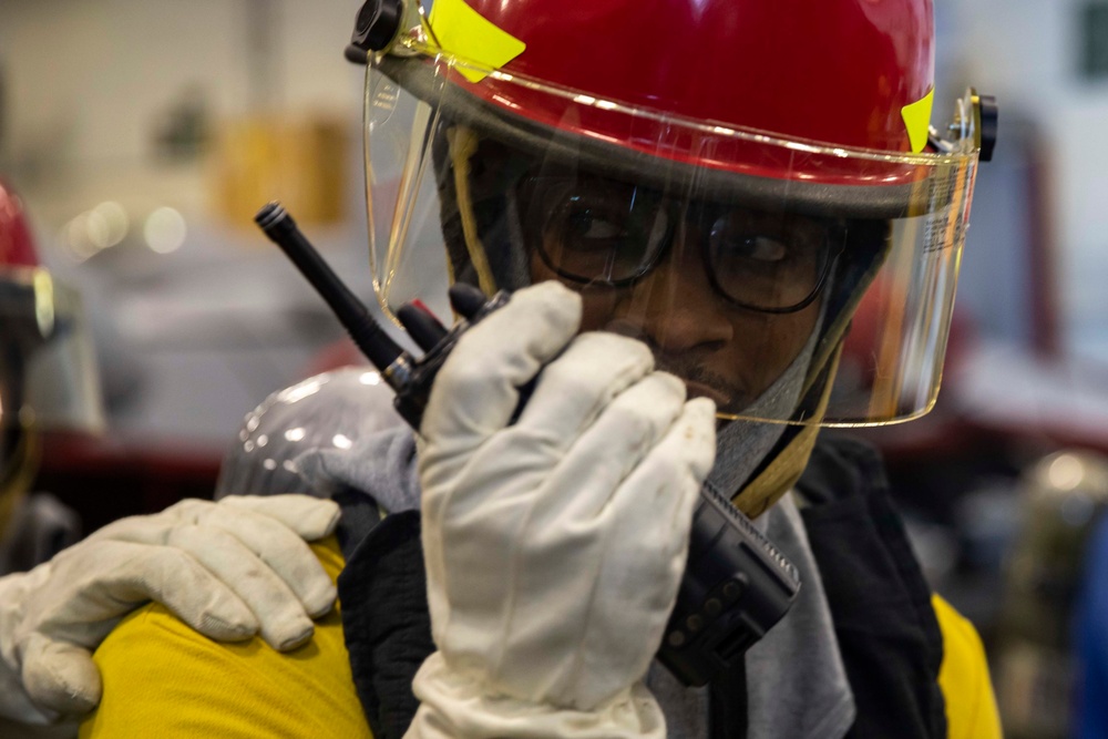USS George H.W. Bush (CVN 77) Sailor Simulates General Quarters
