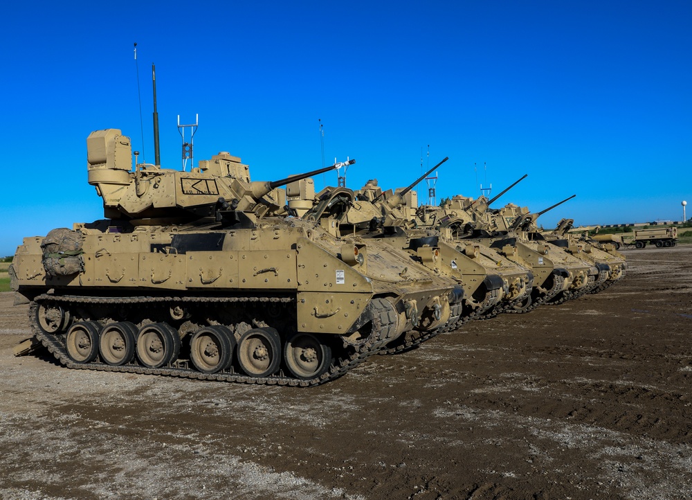 Soldiers from 1st Battalion, 63rd Armor Regiment get ready for gunnery