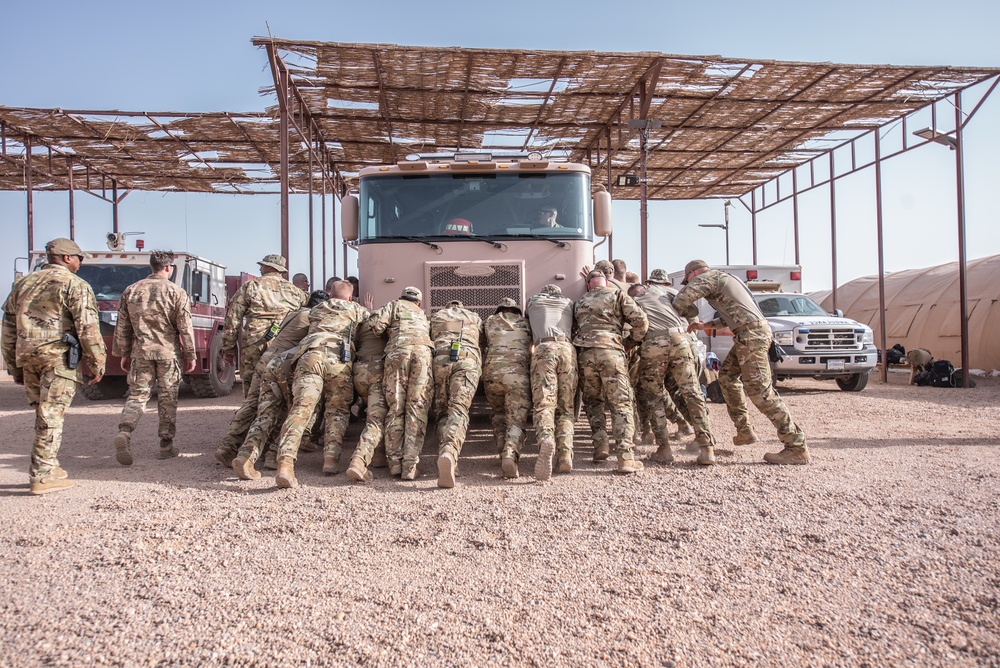 U.S. Air Force fire protection specialists conduct fire engine push ceremony at Nigerien Air Base 201, Niger
