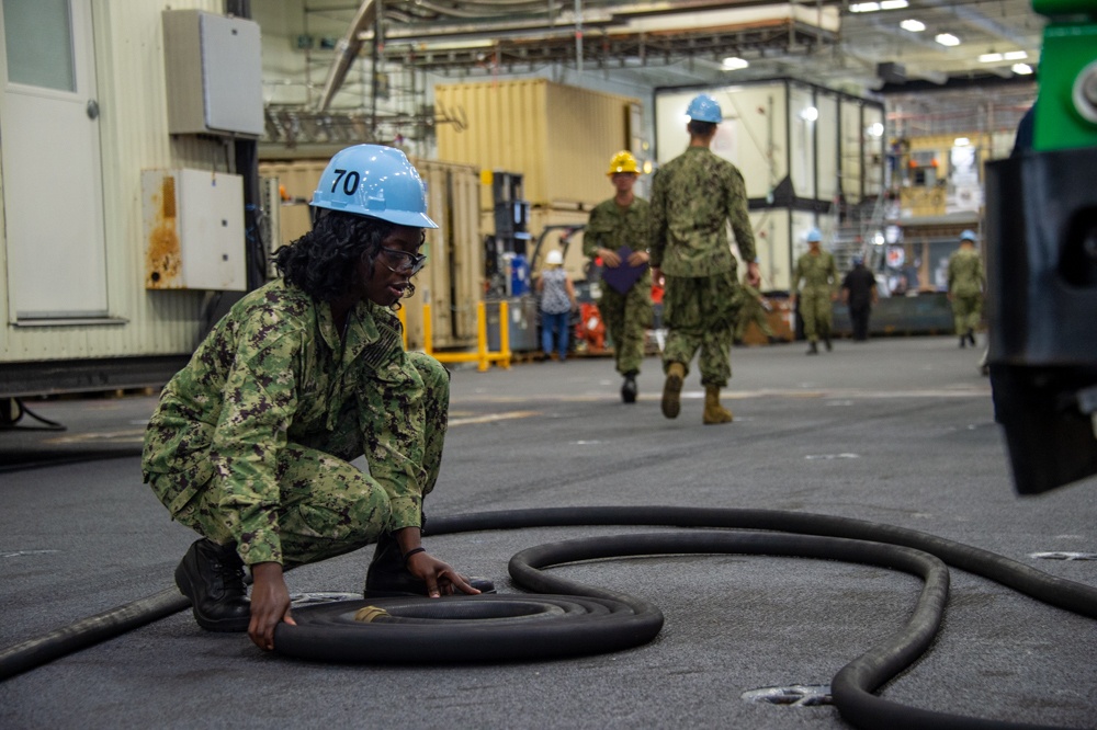 USS Carl Vinson (CVN 70) Sailors Work in Port