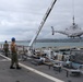 HSC 28 Sailors Load an MQ-8B Fire Scout onto USS Billings