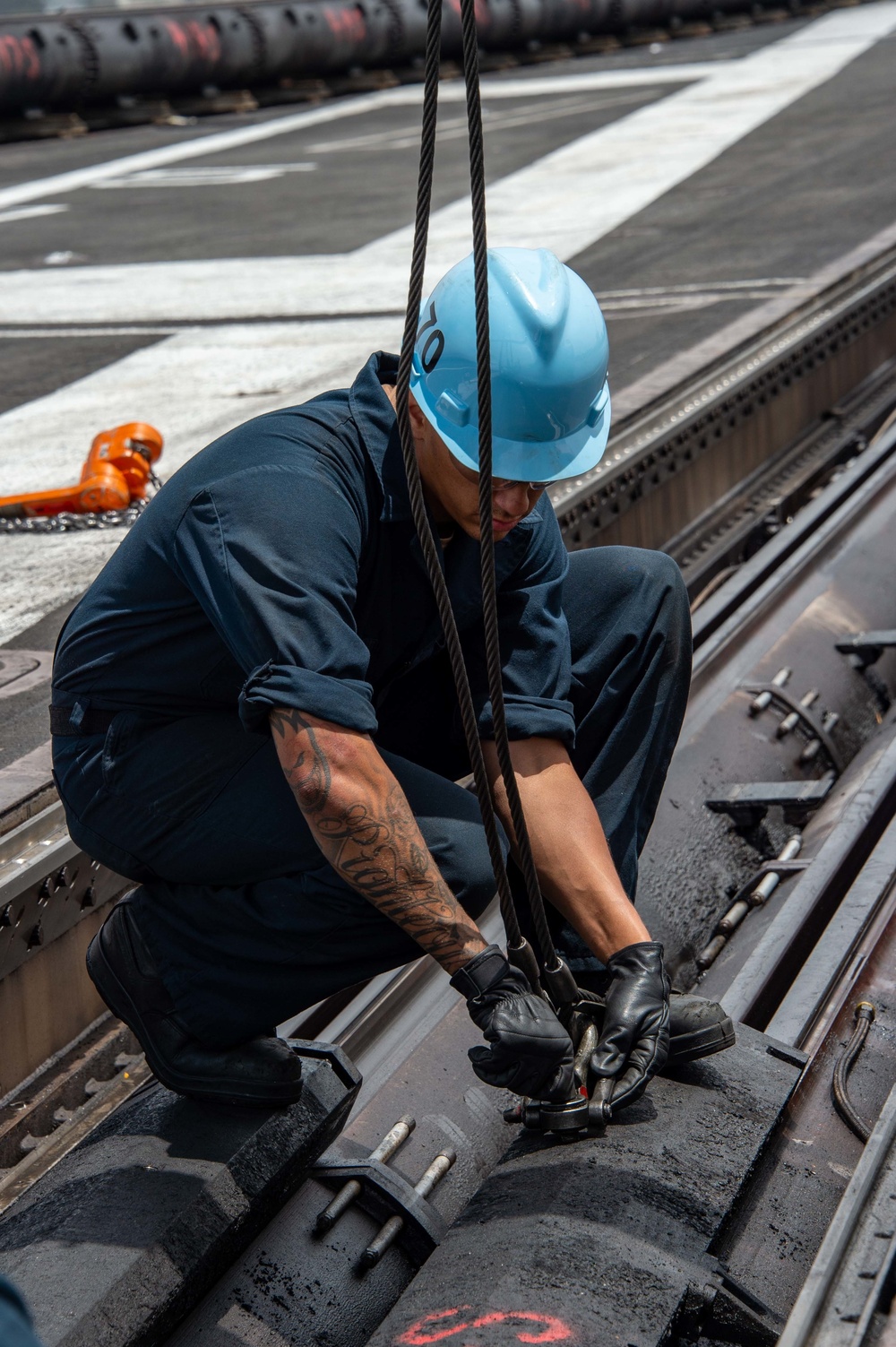 USS Carl Vinson (CVN 70) Sailor Performs Maintenance