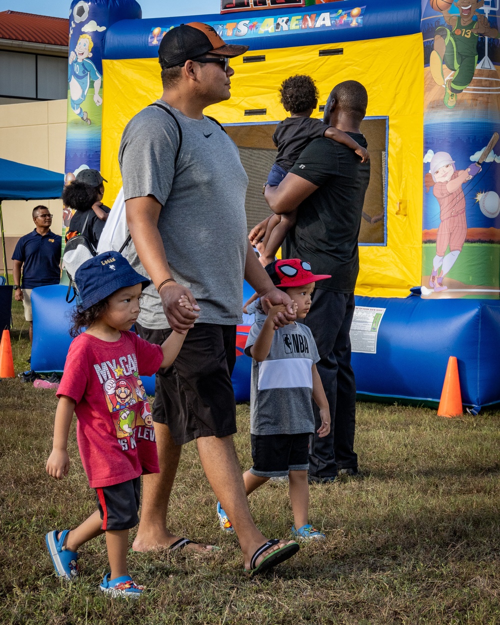 Families Turn Up for Jump House Carnival at Naval Base Guam