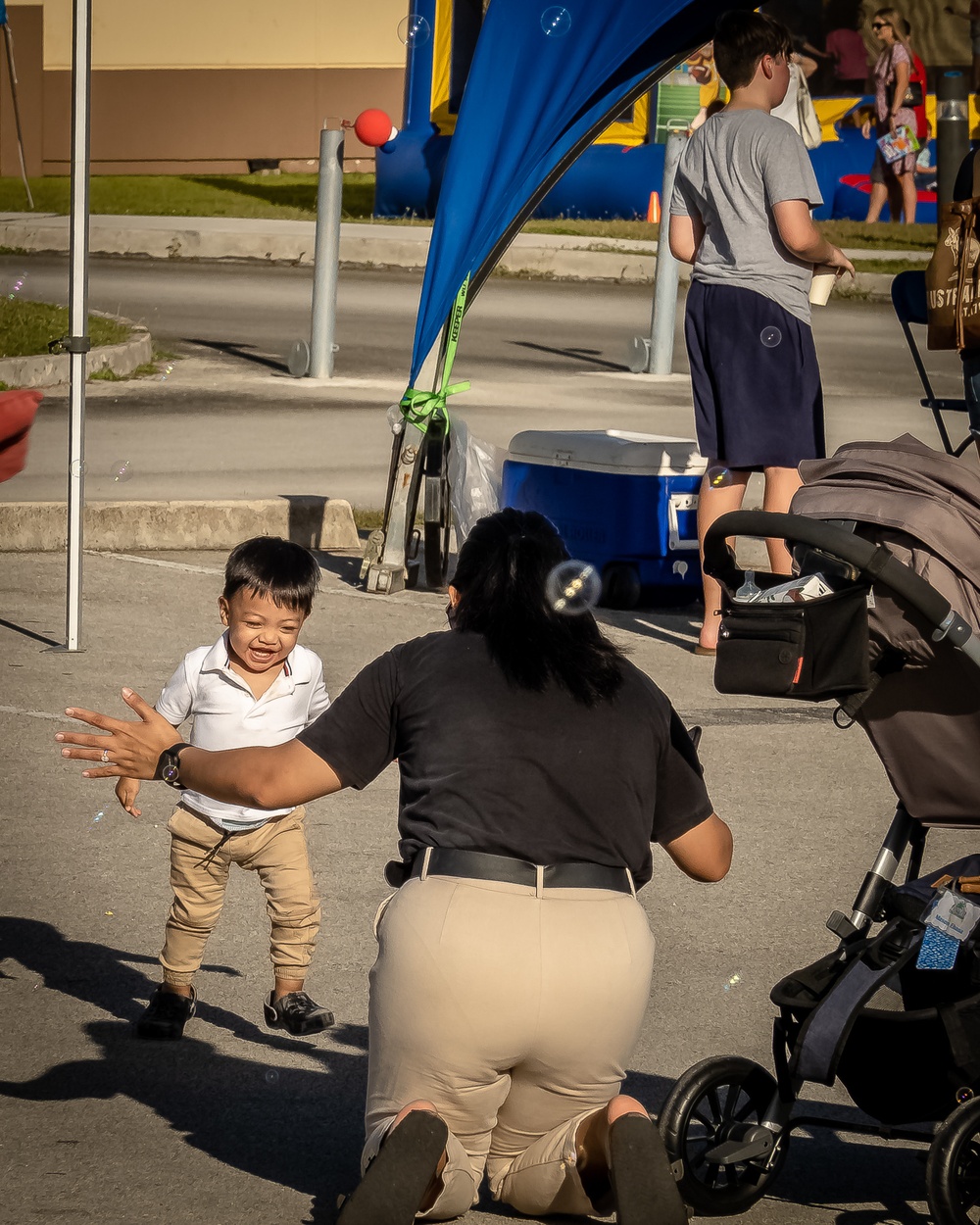 Families Turn Up for Jump House Carnival at Naval Base Guam
