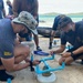 USN and RTN divers participate in marine habitat cleanup during CARAT Thailand
