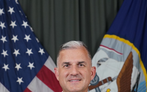 Cmdr. Brad G. Coleman