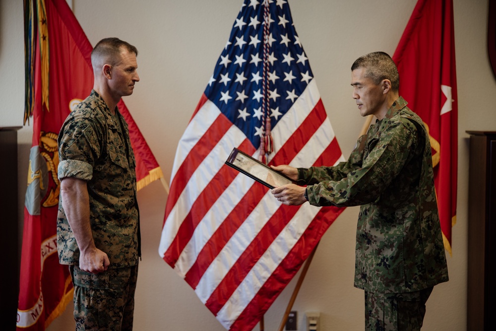 BGen Ellison is awarded by MGen Shingo Nashinoki