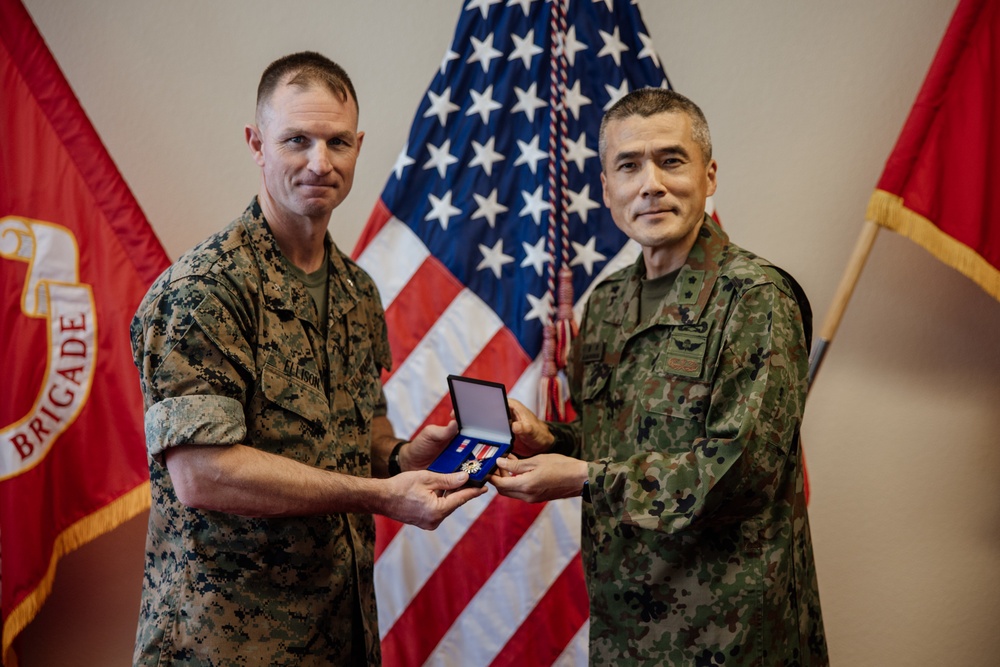 BGen Ellison is awarded by MGen Shingo Nashinoki