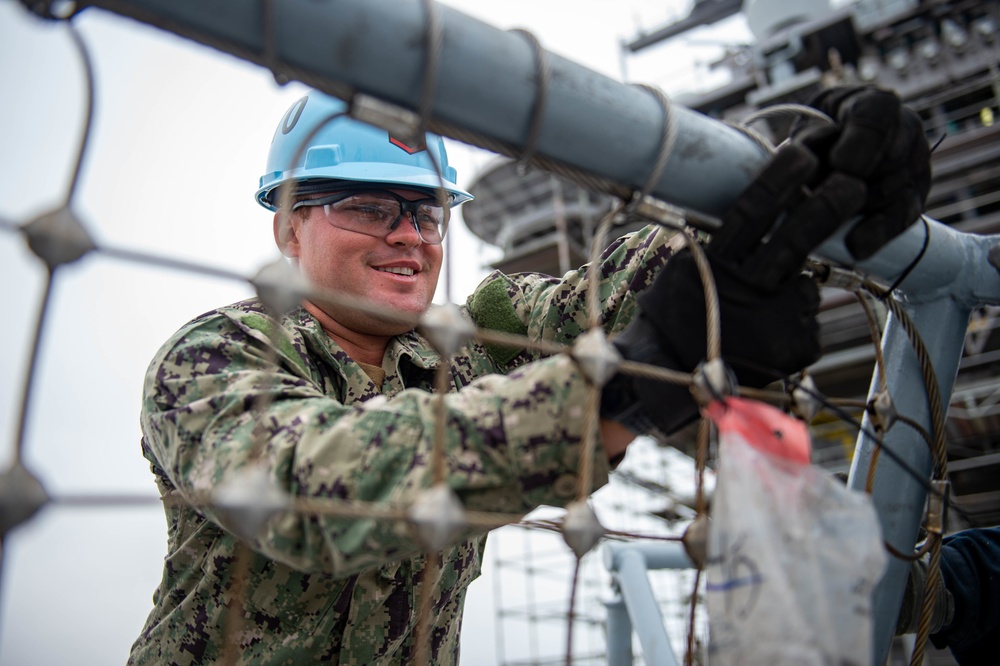 USS Carl Vinson (CVN 70) Sailors Work In-Port