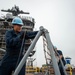 USS Carl Vinson (CVN 70) Sailors Work In Port