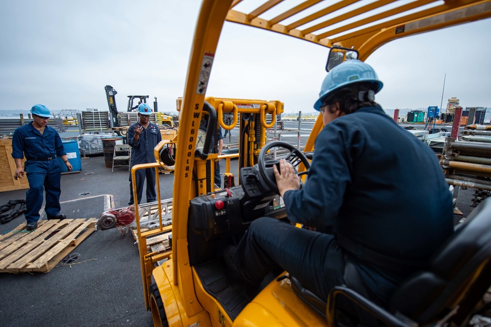 USS Carl Vinson (CVN 70) Sailors Work In-Port