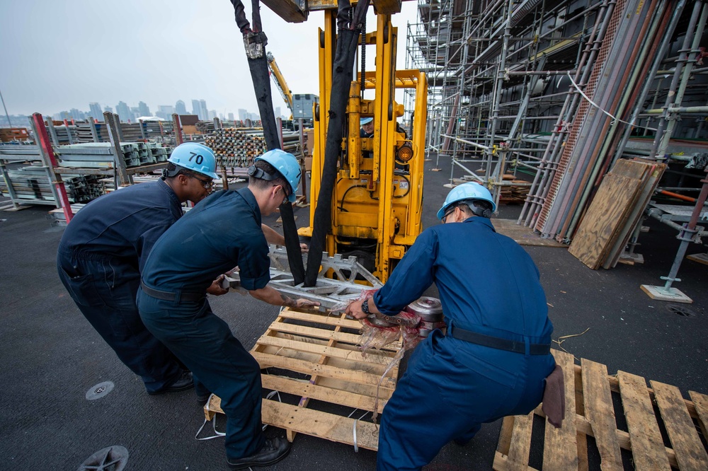 USS Carl Vinson (CVN 70) Sailors Work In-Port