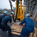 USS Carl Vinson (CVN 70) Sailors Work In-Port