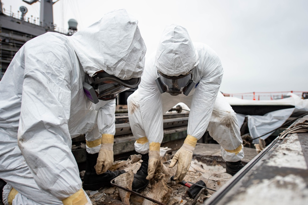 USS Carl Vinson (CVN 70) Sailors Work In Port