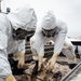 USS Carl Vinson (CVN 70) Sailors Work In Port