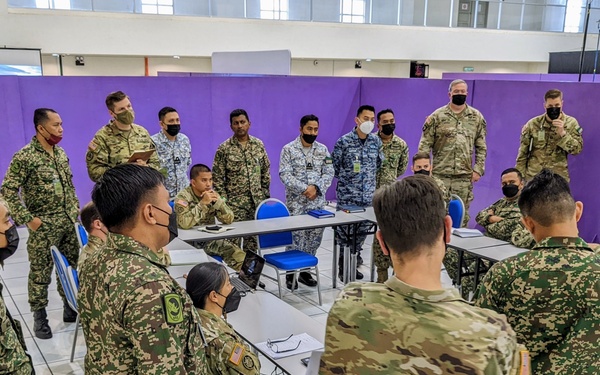 U.S. and Malaysian service members collectively plan