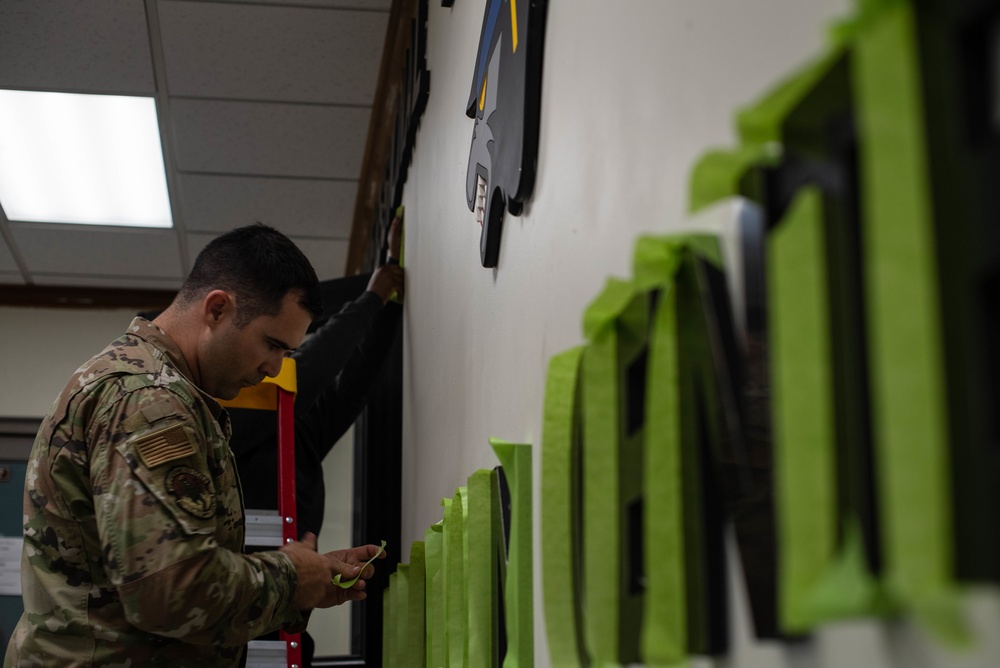 WOLF PACK AIRMEN SUPPORT HABITAT FOR PACKMANITY