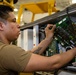 Abraham Lincoln Sailor conducts maintenance