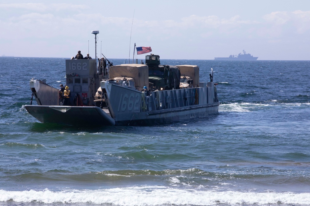 Landing Craft Utility boat offloads Marines onto the shore of Gotland Island