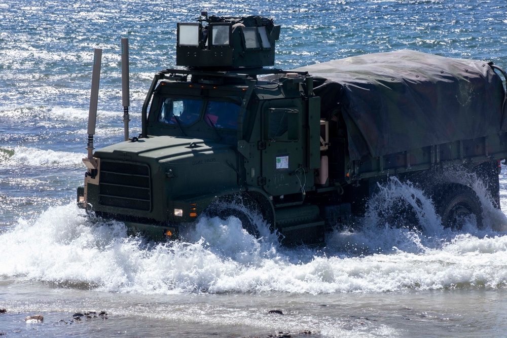 Landing Craft Utility boat offloads Marines onto the shore of Gotland Island