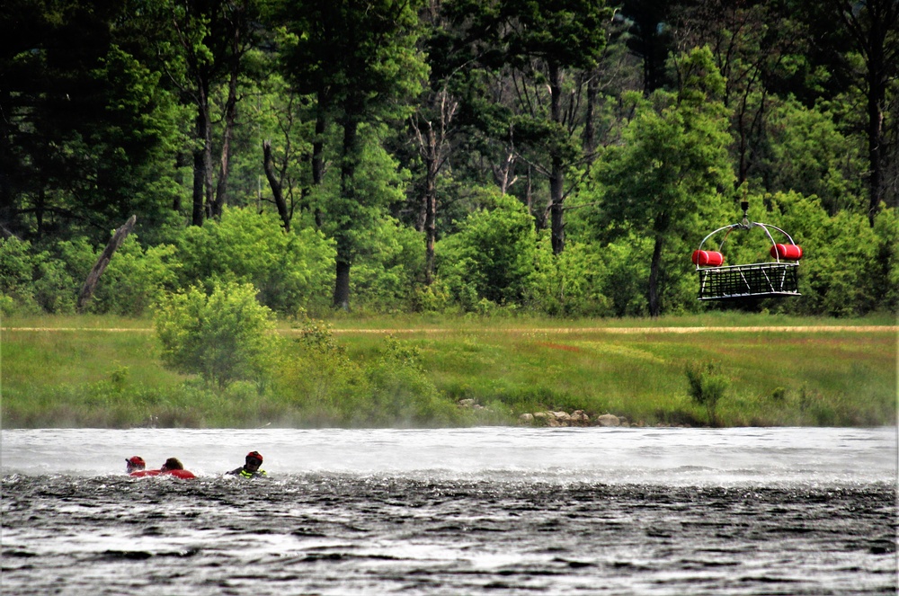 Wisconsin National Guard's 1st Battalion, 147th Aviation Regiment crews hold live-hoist training at Fort McCoy