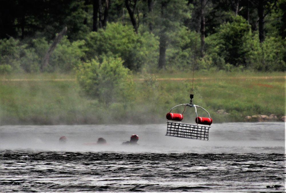 Wisconsin National Guard's 1st Battalion, 147th Aviation Regiment crews hold live-hoist training at Fort McCoy