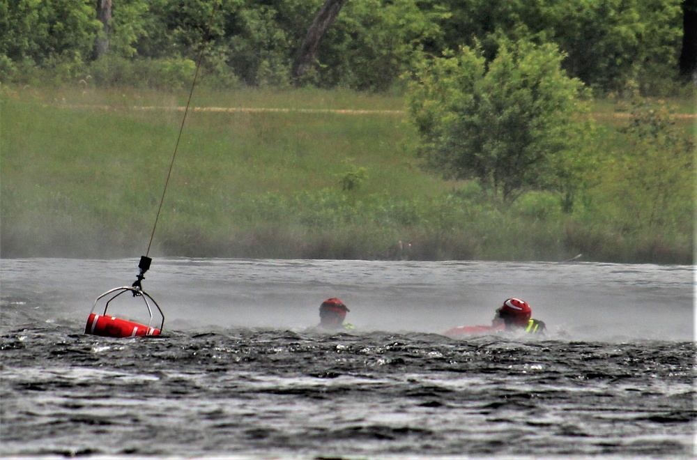 Wisconsin National Guard's 1st Battalion, 147th Aviation Regiment crews hold live-hoist training at Fort McCoy