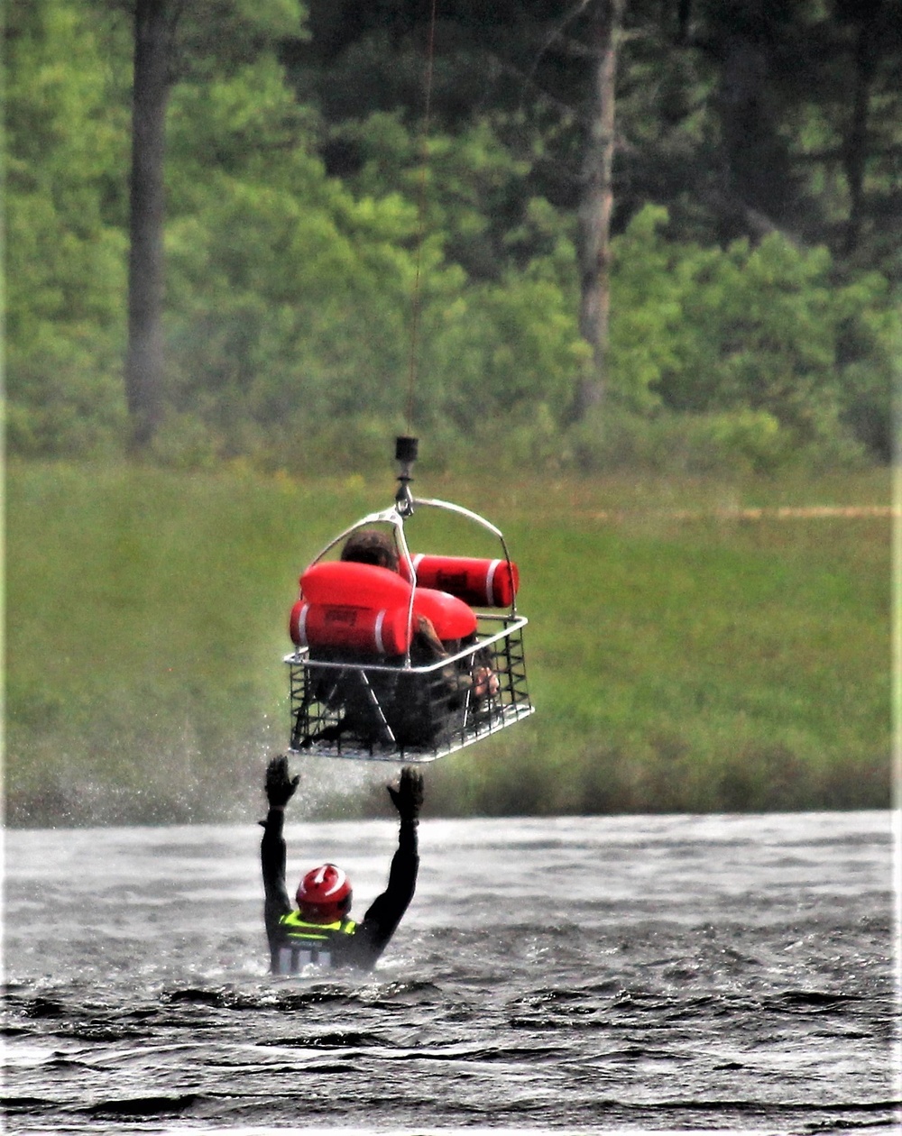 Wisconsin National Guard's 1st Battalion, 147th Aviation Regiment crews hold live-hoist training at Fort McCoy