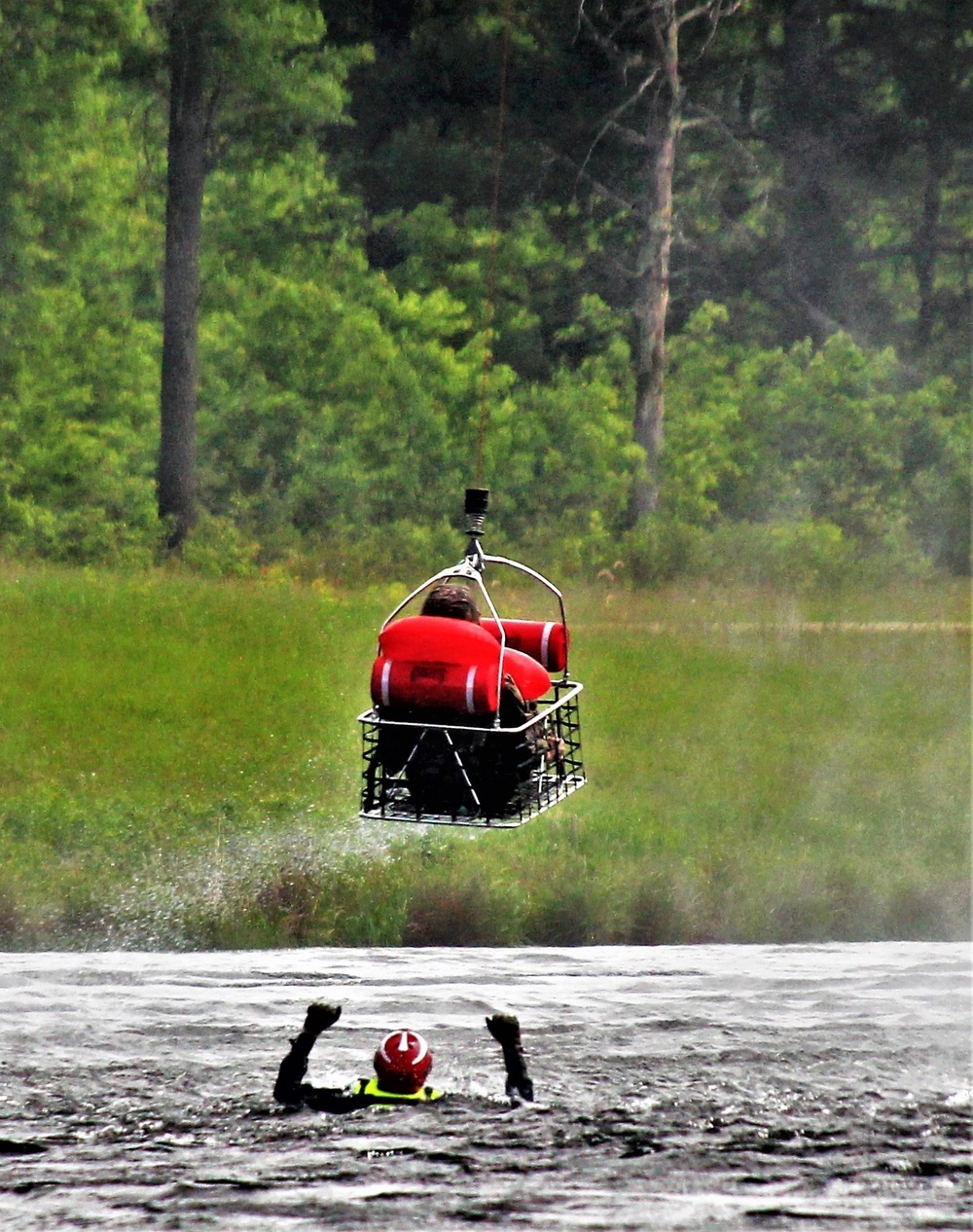 Wisconsin National Guard's 1st Battalion, 147th Aviation Regiment crews hold live-hoist training at Fort McCoy