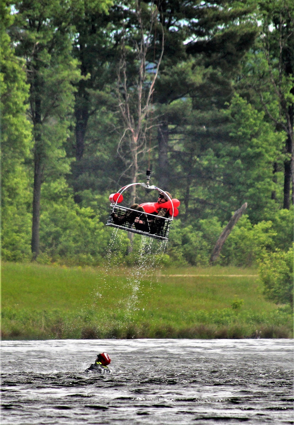 Wisconsin National Guard's 1st Battalion, 147th Aviation Regiment crews hold live-hoist training at Fort McCoy