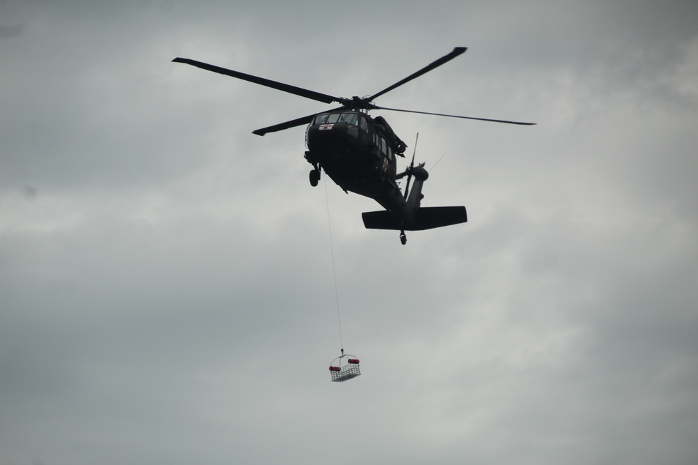 Wisconsin National Guard's 1st Battalion, 147th Aviation Regiment crews hold live-hoist training at Fort McCoy