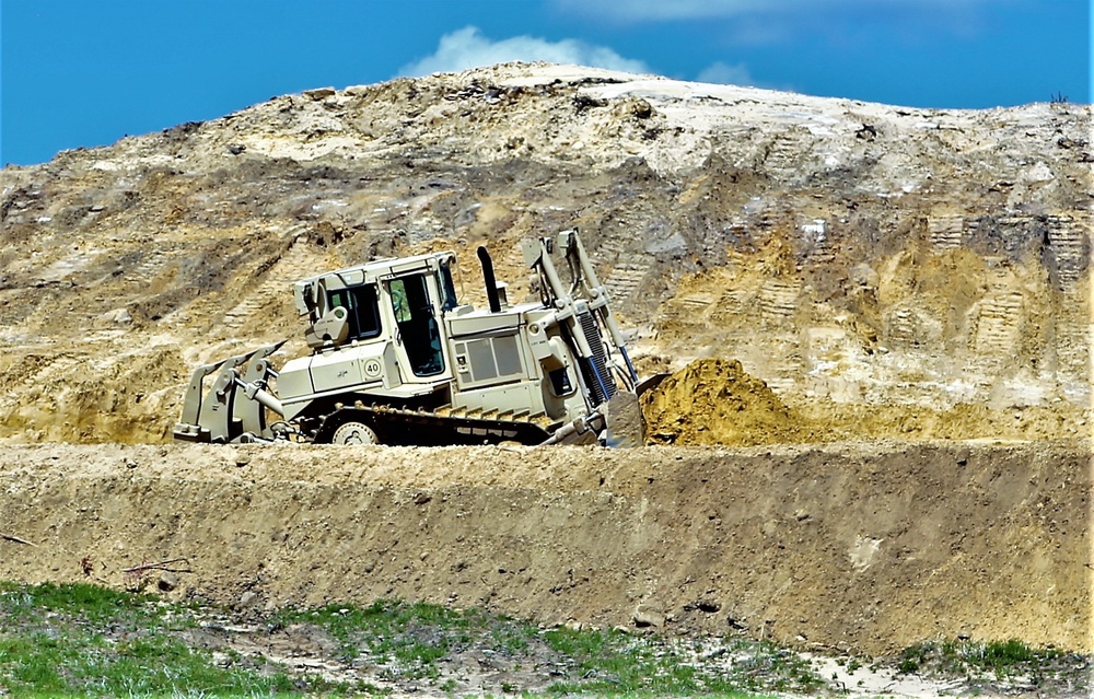 Army Reserve engineer company Soldiers continue work on earth-moving troop project at Fort McCoy