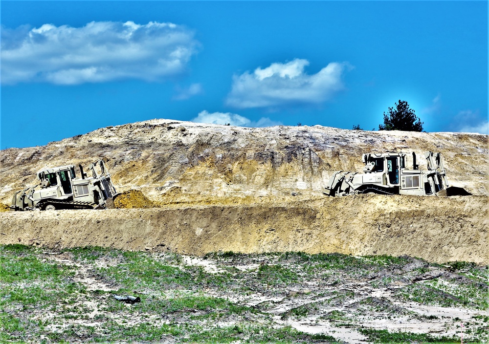 Army Reserve engineer company Soldiers continue work on earth-moving troop project at Fort McCoy