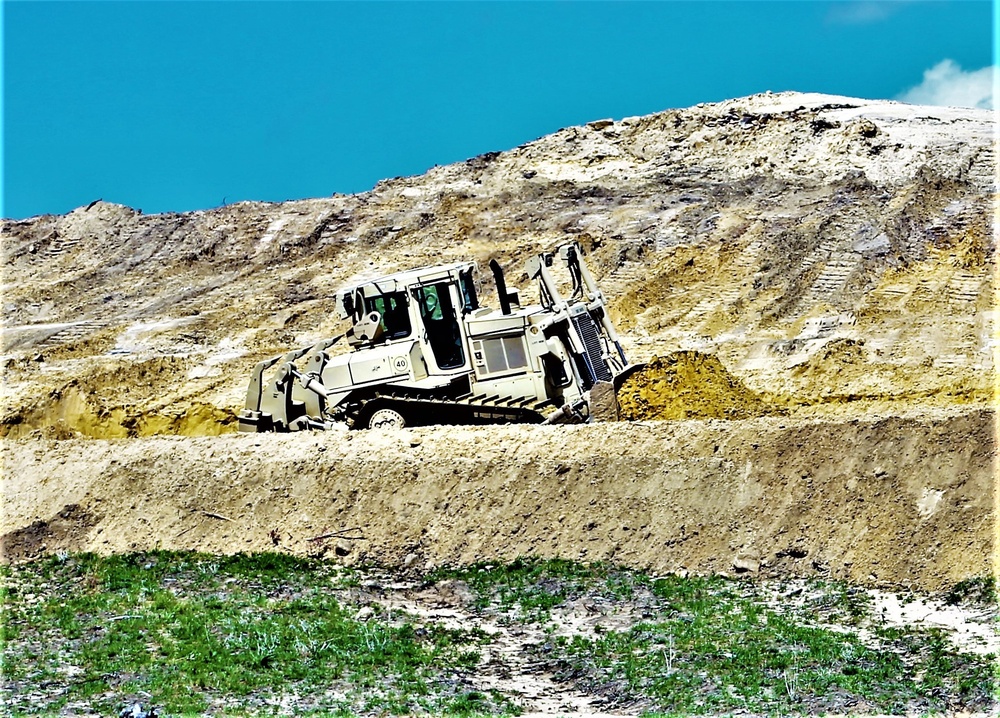 Army Reserve engineer company Soldiers continue work on earth-moving troop project at Fort McCoy