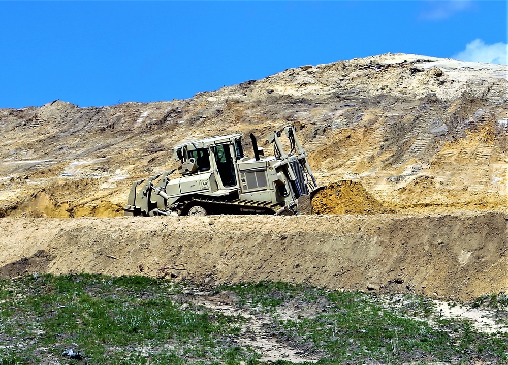 Army Reserve engineer company Soldiers continue work on earth-moving troop project at Fort McCoy