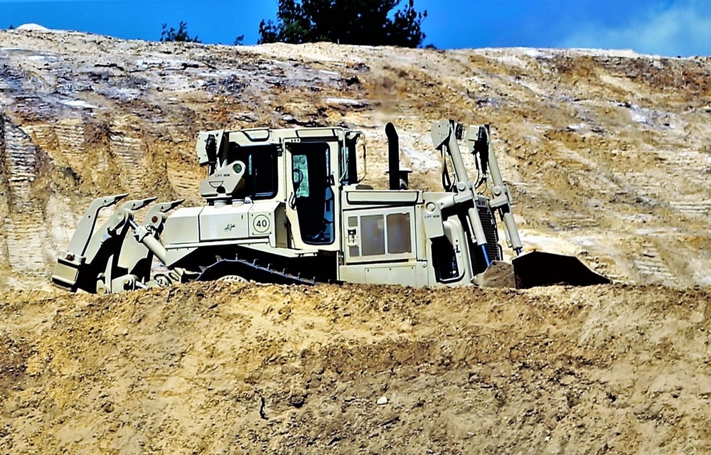 Army Reserve engineer company Soldiers continue work on earth-moving troop project at Fort McCoy