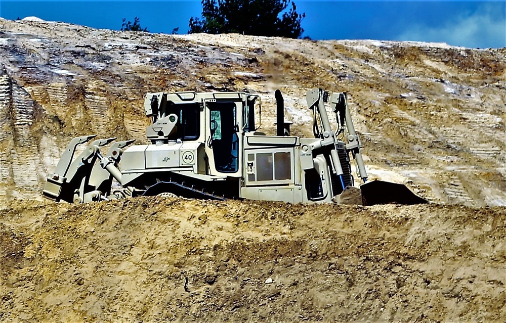 Army Reserve engineer company Soldiers continue work on earth-moving troop project at Fort McCoy