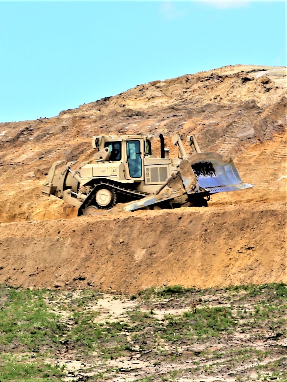 Army Reserve engineer company Soldiers continue work on earth-moving troop project at Fort McCoy