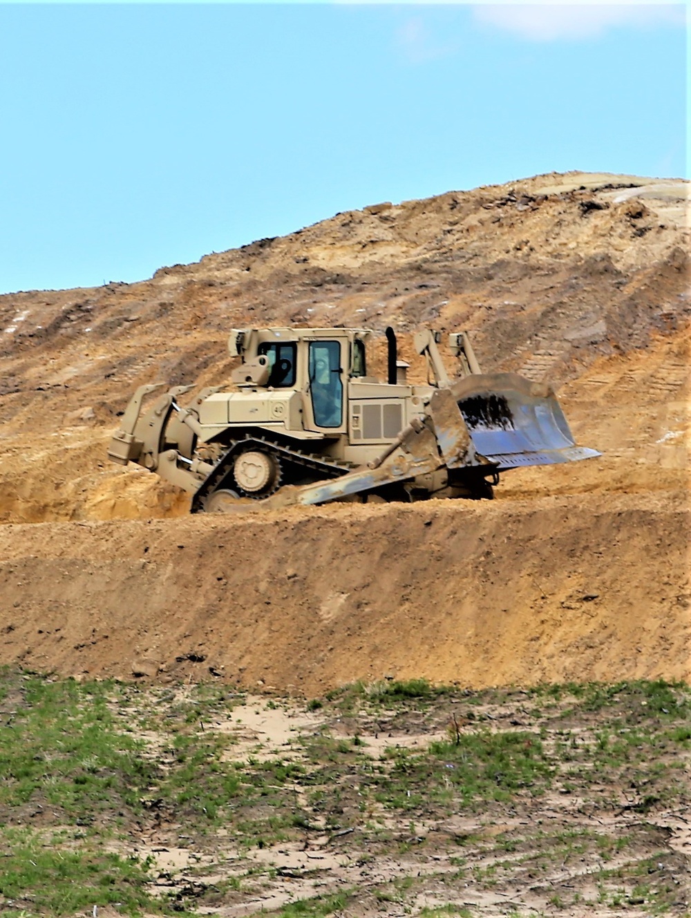 Army Reserve engineer company Soldiers continue work on earth-moving troop project at Fort McCoy