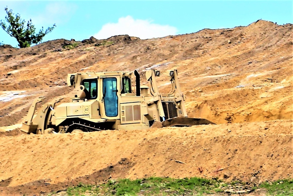 Army Reserve engineer company Soldiers continue work on earth-moving troop project at Fort McCoy